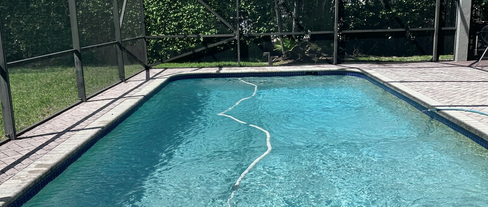 Screened-in pool serviced by Pool King in Pembroke Pines, Florida